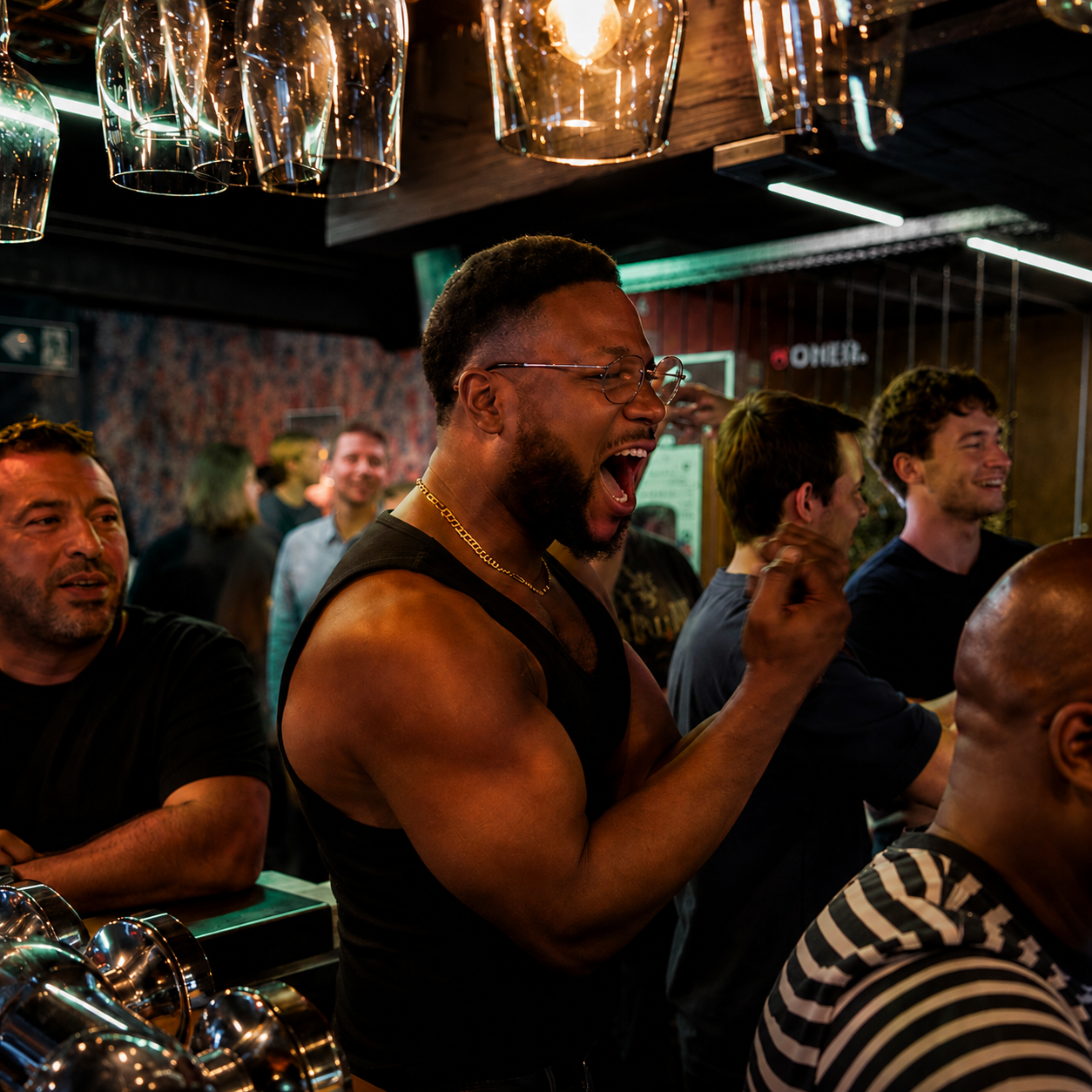 Guest cheering excitedly inside DownTown bar
